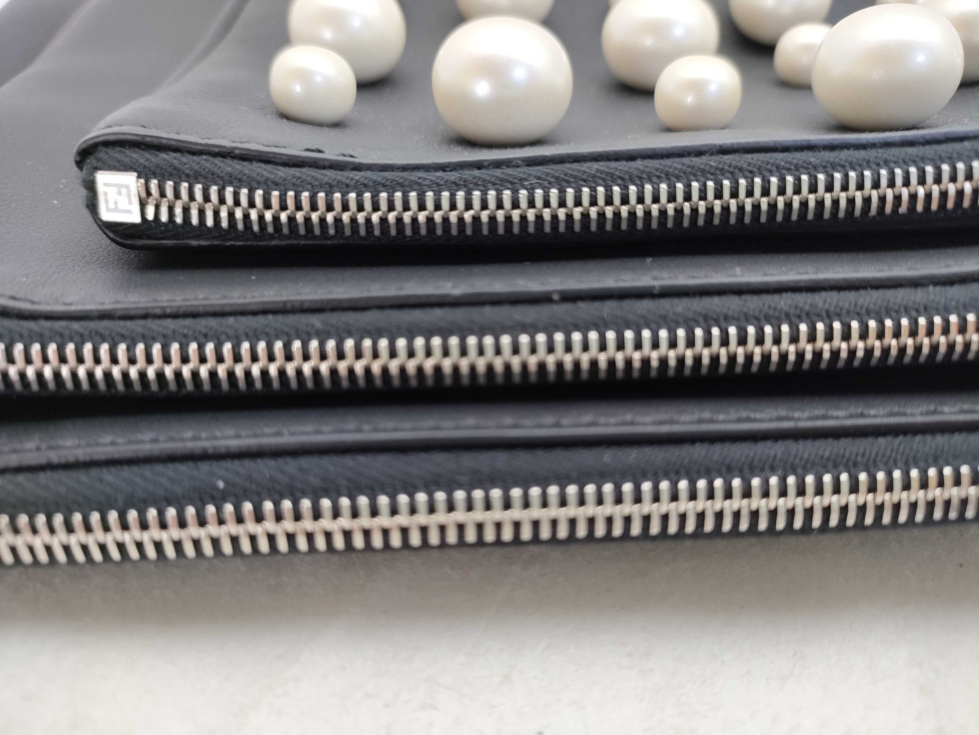 FENDI Triplet Leather Clutch Bag in Black with Faux Pearls