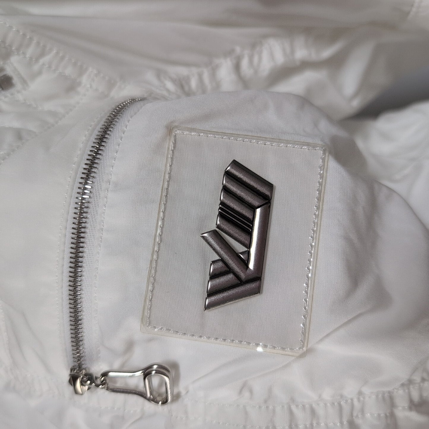 LOUIS VUITTON Excellent condition white zip-up jacket with LV logo patch.