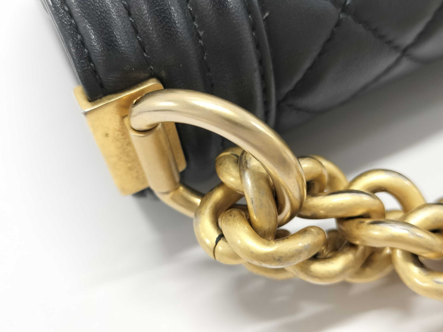 CHANEL Boy Black Lambskin Matelasse Shoulder Bag with Gold Hardware and Chain, 25 Series