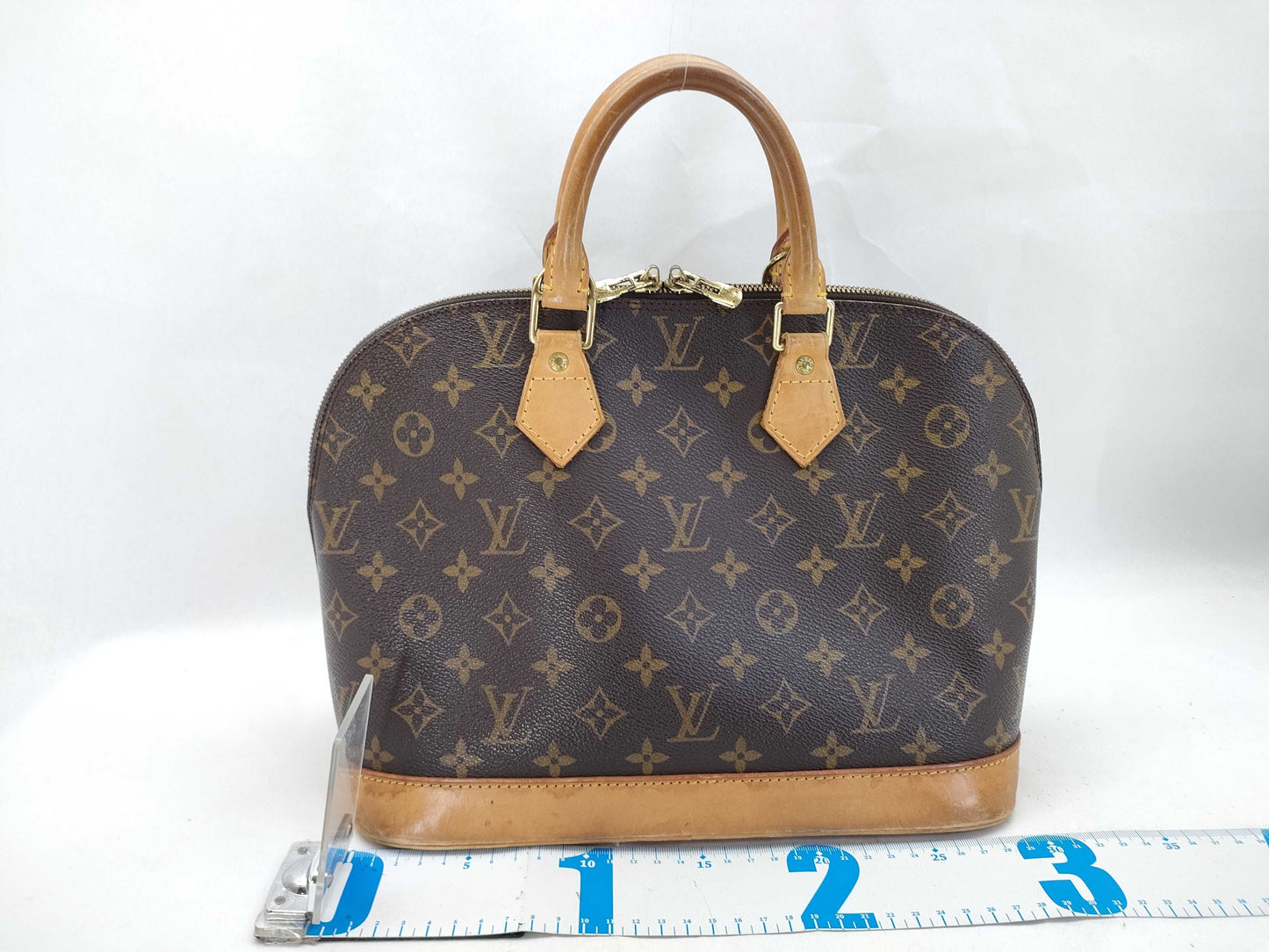 LOUIS VUITTON Monogram Alma Handbag