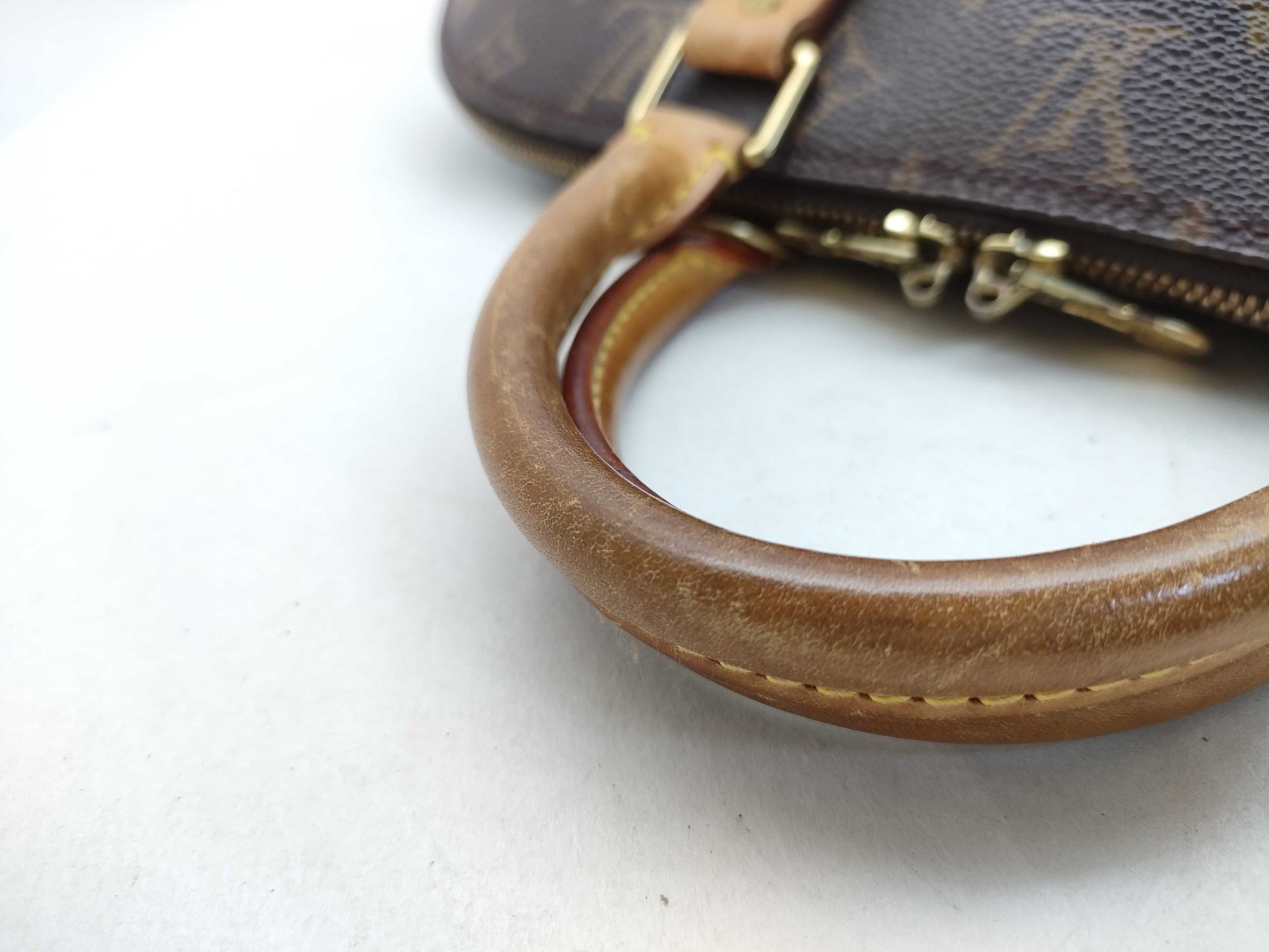 LOUIS VUITTON Monogram Alma Handbag