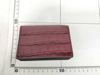 Excellent condition Alexander McQueen skull chain card case.