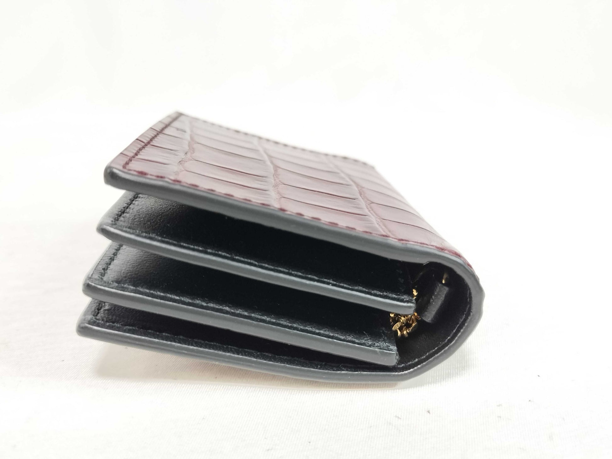 Excellent condition Alexander McQueen skull chain card case.