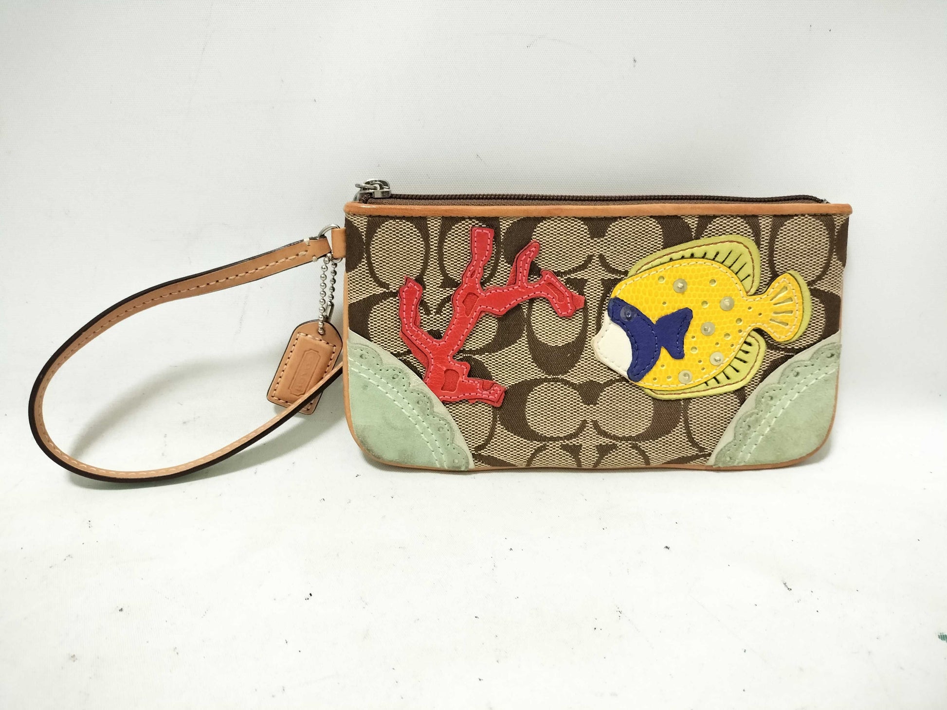 COACH Signature Wristlet Pouch with Fish and Coral Design
