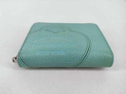 Tiffany & Co. Tiffany coin case mini wallet. Accessories: Box, wallet.