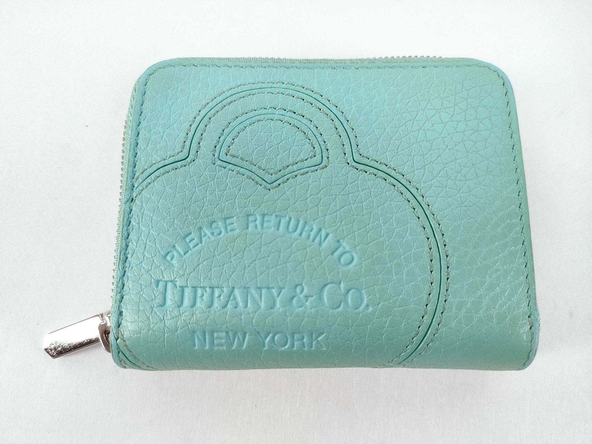 Tiffany & Co. Tiffany coin case mini wallet. Accessories: Box, wallet.
