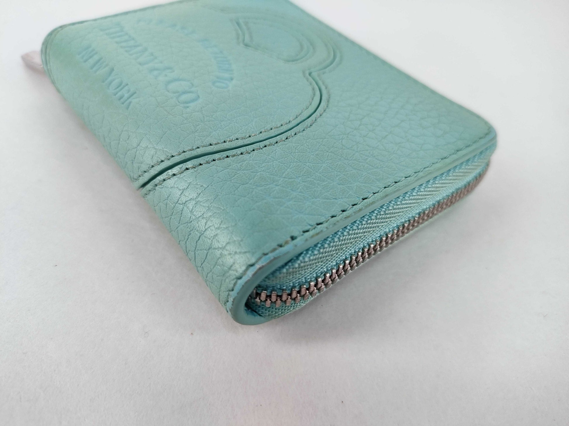 Tiffany & Co. Tiffany coin case mini wallet. Accessories: Box, wallet.