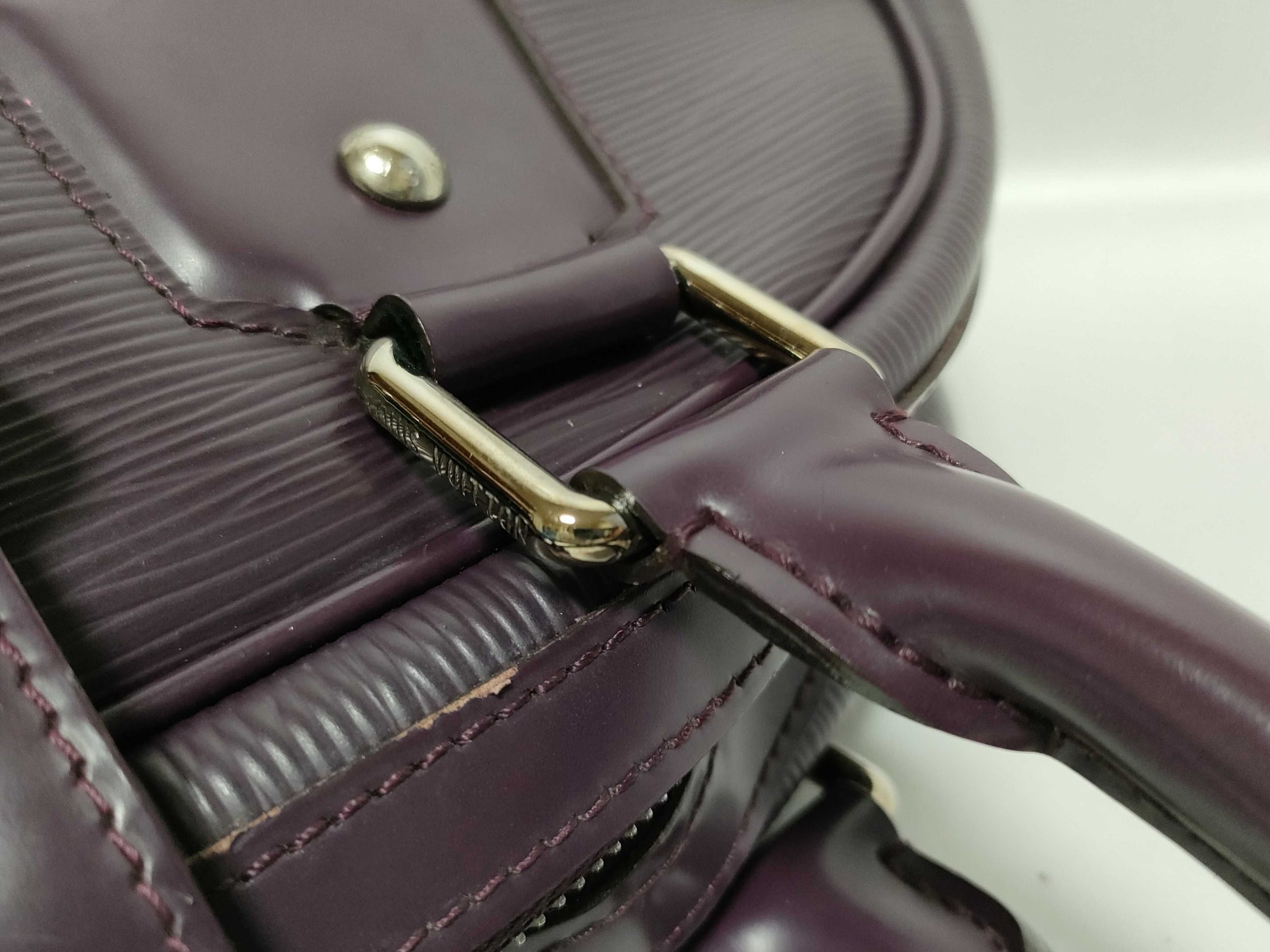 LOUIS VUITTON Epi Leather Montaigne GM Purple Epi Leather Handbag with Silver Hardware