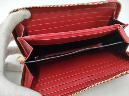 Yves Saint Laurent round zipper red wallet