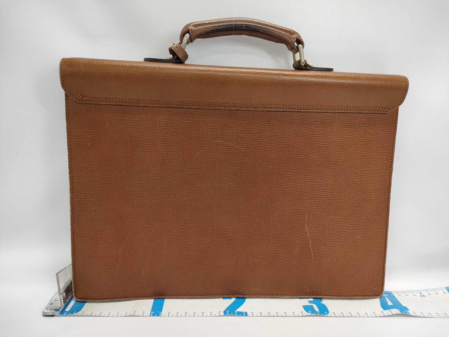 Burberry's Brown Leather Business Bag with Name Tag and Key