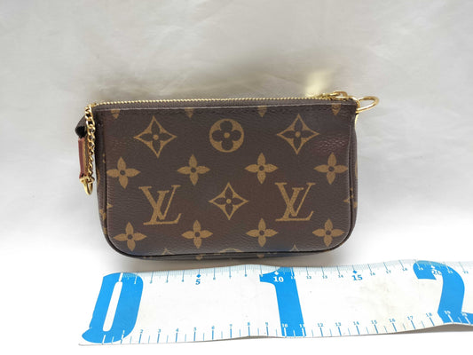 LOUIS VUITTON Monogram Pochette Accessoires Mini Monogram M58009 Brown with Gold Hardware, PVC Coated Canvas, SF4252 Handbag