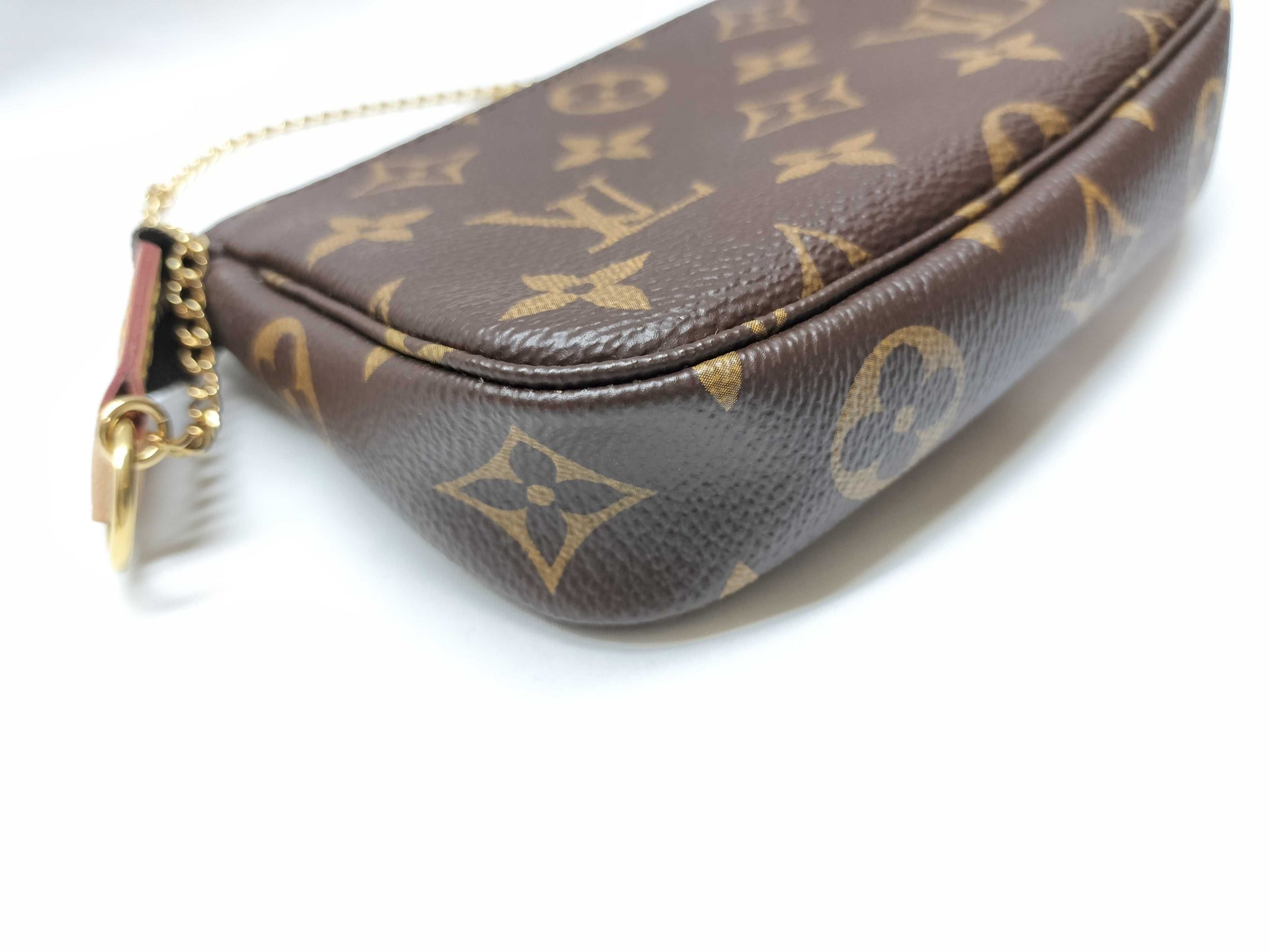 LOUIS VUITTON Monogram Pochette Accessoires Mini Monogram M58009 Brown with Gold Hardware, PVC Coated Canvas, SF4252 Handbag