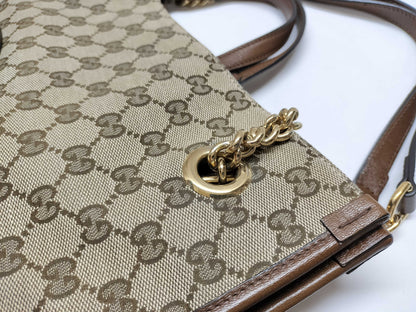 GUCCI GG Supreme Horsebit 1955 2-way tote bag in beige, brown, and gold hardware. GG canvas shoulder bag.