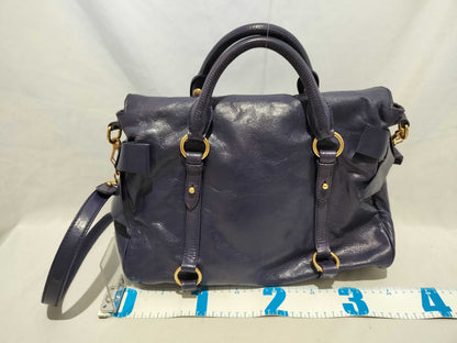 Miu Miu Vitello 2-way shoulder bag with side ribbon in purple