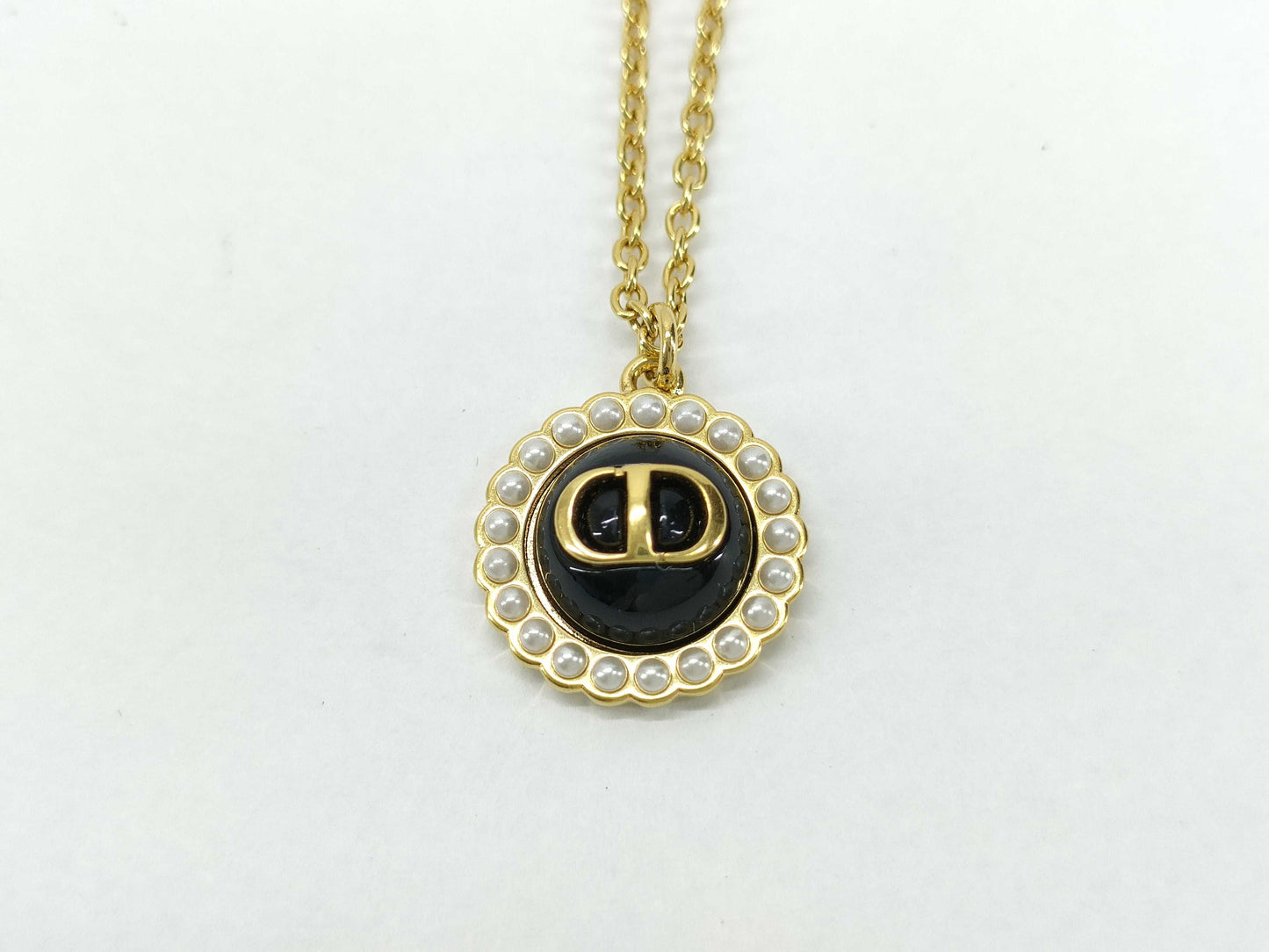 Dior CD logo necklace with faux pearls in gold and black