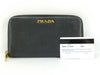 PRADA Vitello Dino 1M0506 Leather Round Zip Wallet in Black