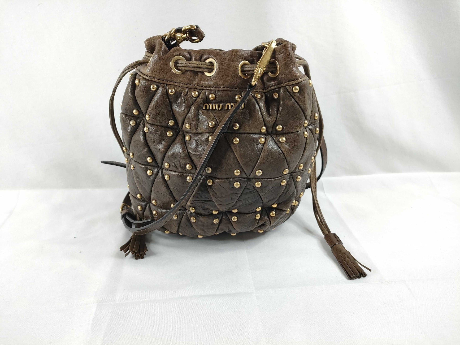 Miu Miu shoulder bag with drawstring and studs