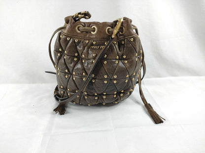 Miu Miu shoulder bag with drawstring and studs