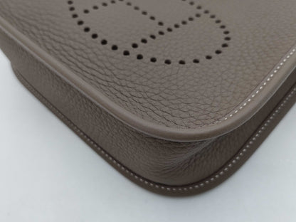 HERMES Evelyn TPM Taurillon Clemence Etoupe/Blue Indigo Shoulder Bag with Silver Hardware and Double Stamp