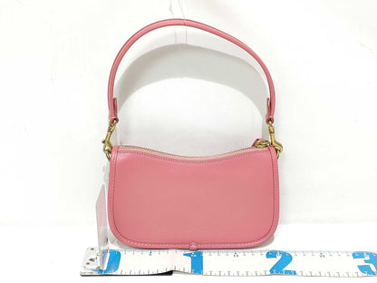 COACH Swinger Handbag