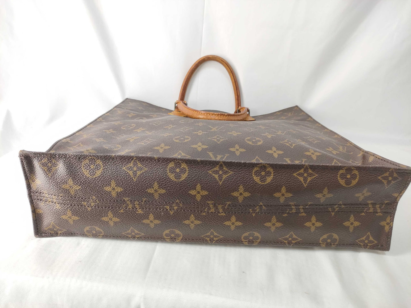 LOUIS VUITTON Monogram Louis Vuitton Sack Pla Monogram Handbag