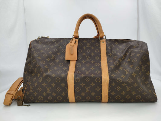 LOUIS VUITTON Louis Vuitton Monogram Kipol Banduriere 55 Boston Bag