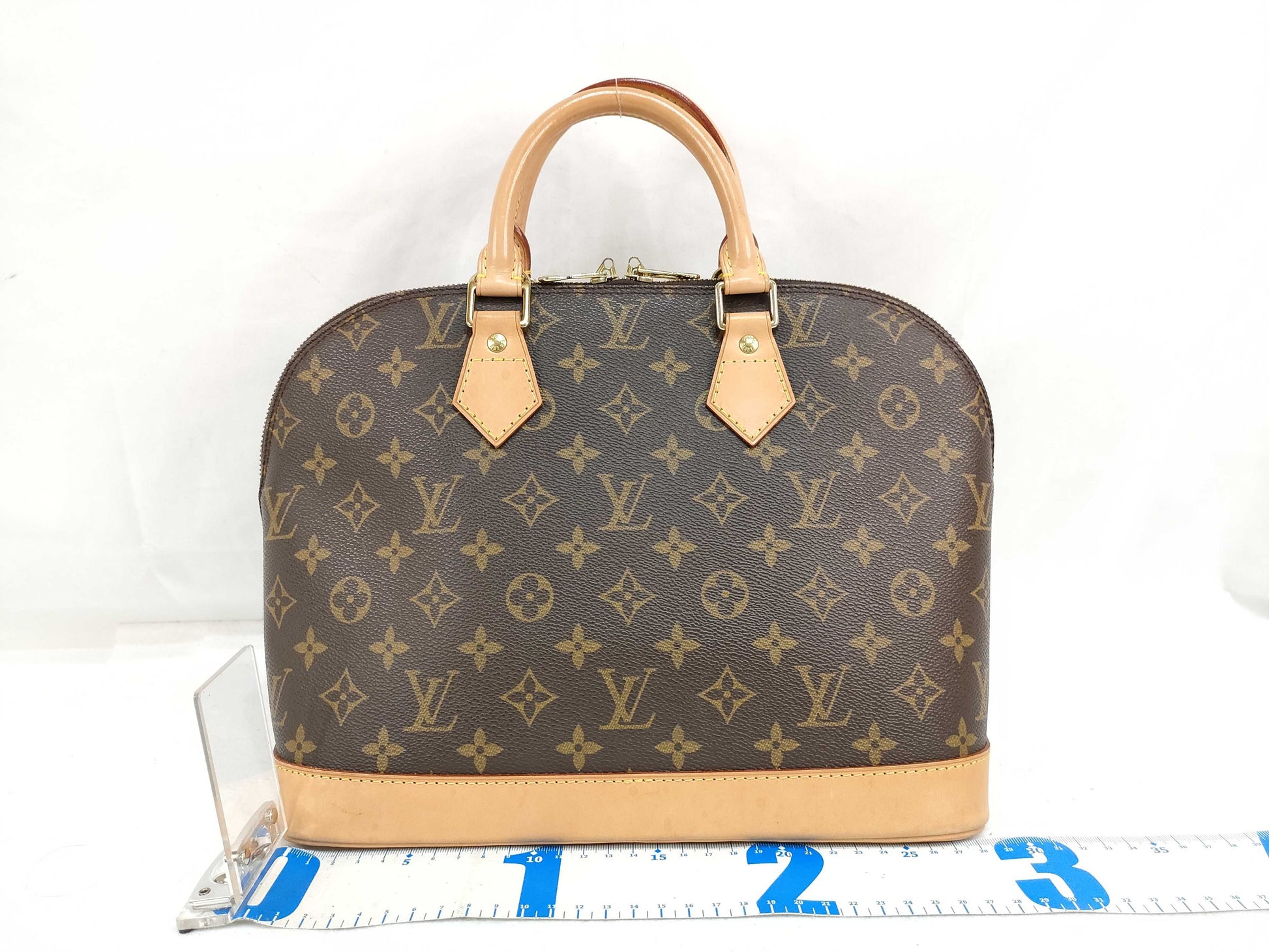 LOUIS VUITTON Monogram Vuitton Alma Handbag