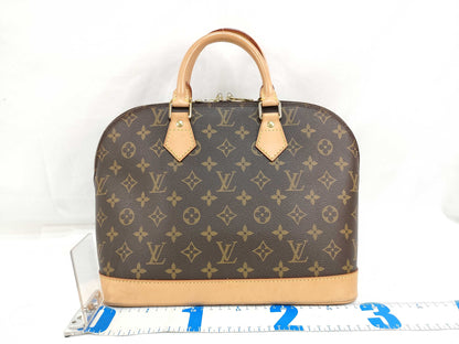 LOUIS VUITTON Monogram Vuitton Alma Handbag