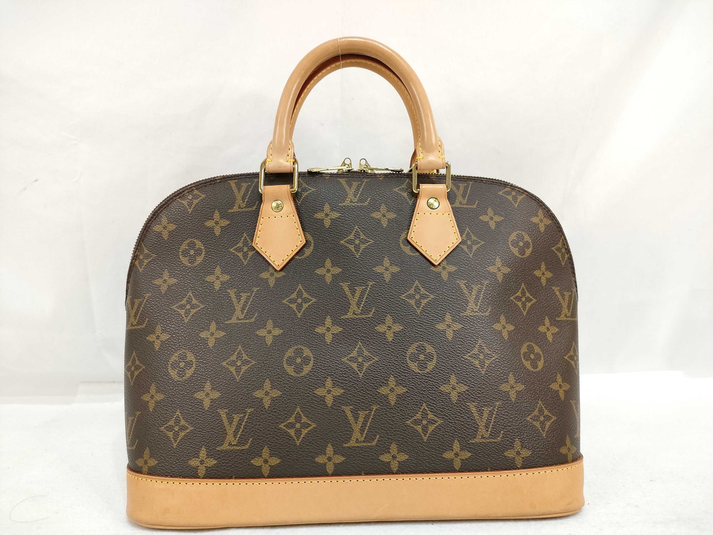 LOUIS VUITTON Monogram Vuitton Alma Handbag