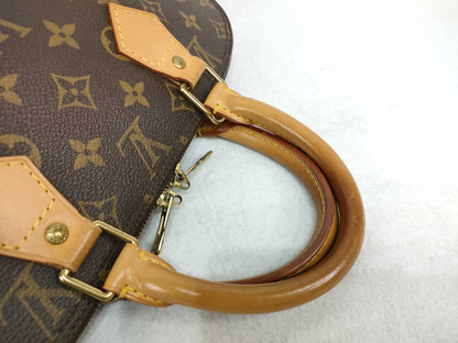 LOUIS VUITTON Monogram Vuitton Alma Handbag