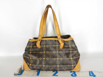 LOUIS VUITTON Monogram Louis Vuitton Coated Canvas Handbag