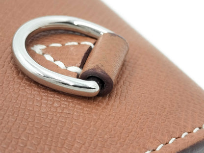 HERMES Evelyn TPMK Stamped Taurillon Leather Shoulder Bag with Silver Hardware and Red Strap