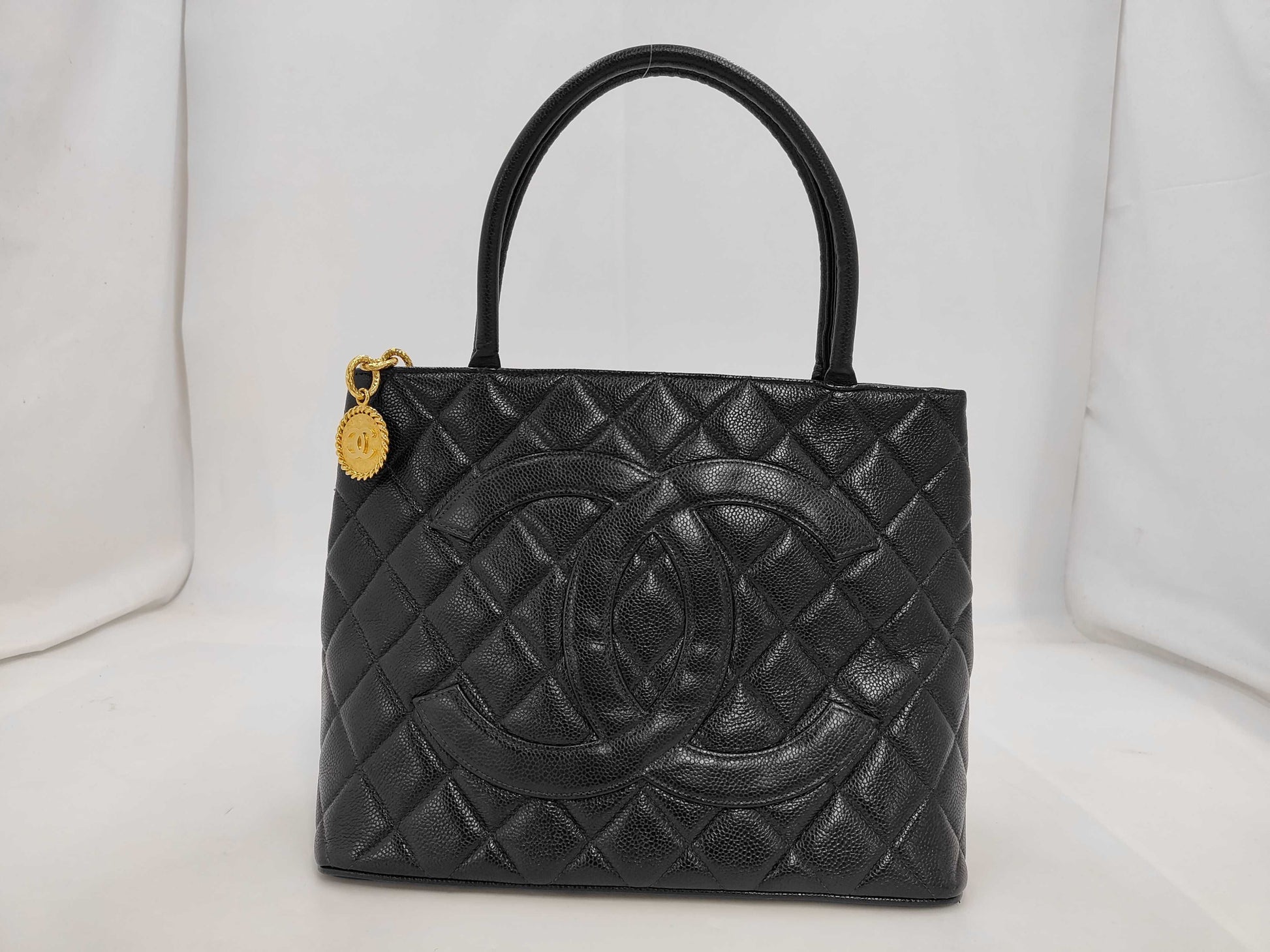 CHANEL Matelasse Reissue Tote Bag in Caviar Leather, Black with Gold Hardware