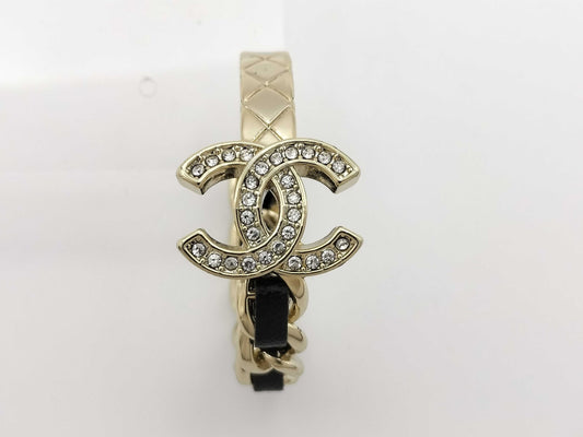 CHANEL Coco Mark Earrings, One Side, Metal, Leather, and Crystal, Gold and Black, B23K