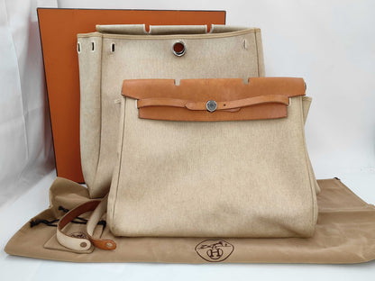HERMES Airbag MM Handbag, □B Stamp, Toile H Leather, Natural Brown, Includes Cloche, Padlock, Two Keys, Box, Dust Bag, and Spare Bag