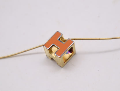 HERMES GPH Cube Orange Gold Necklace with Box