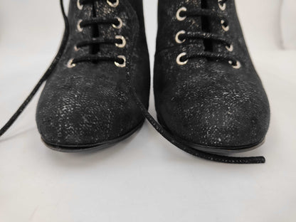 CHANEL Pearl-embellished short boots in black leather, size 37, with box and dust bag. Other shoes.