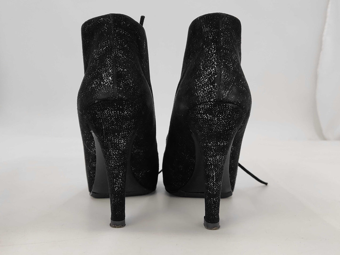 CHANEL Pearl-embellished short boots in black leather, size 37, with box and dust bag. Other shoes.