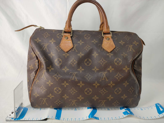 LOUIS VUITTON Monogram Vuitton Speedy 30 Handbag