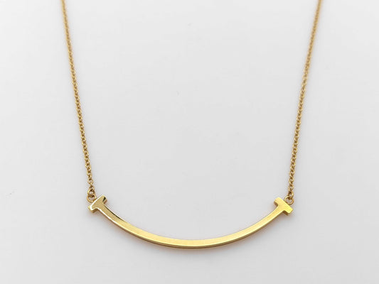 Tiffany & Co. T Smile Small Necklace in Yellow Gold and AU750, 2.8g 