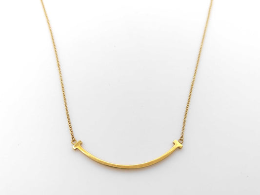 Tiffany & Co. T Smile Small Necklace in Yellow Gold and AU750, 2.8g 