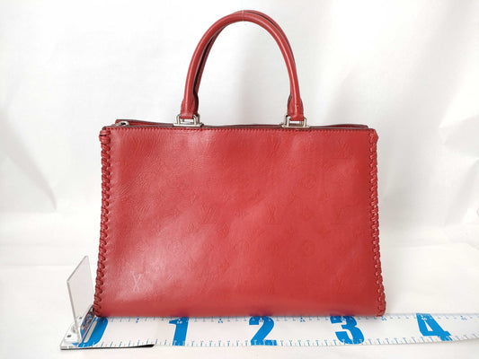 LOUIS VUITTON Very Zip Tote Leather/Ruby Handbag