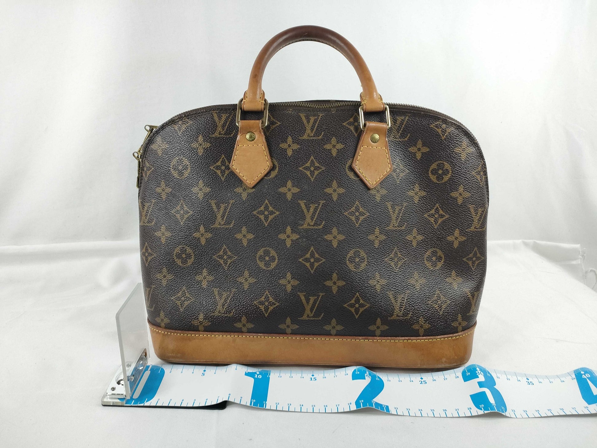LOUIS VUITTON Monogram Alma Handbag