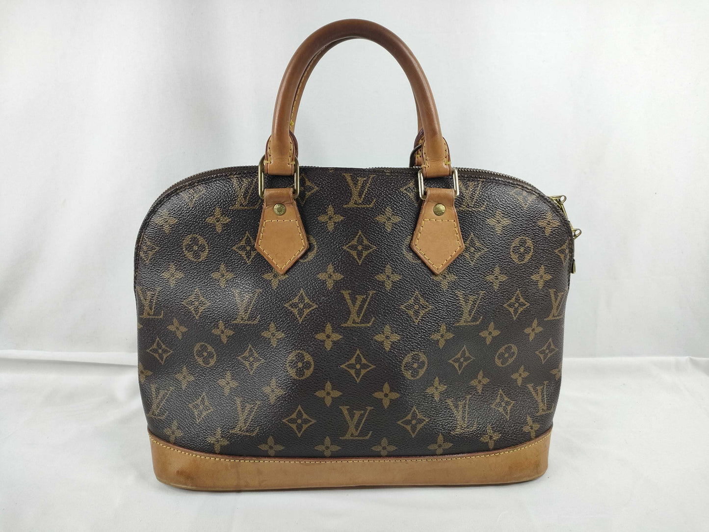 LOUIS VUITTON Monogram Alma Handbag