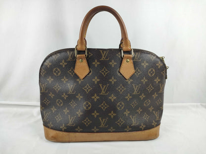 LOUIS VUITTON Monogram Alma Handbag