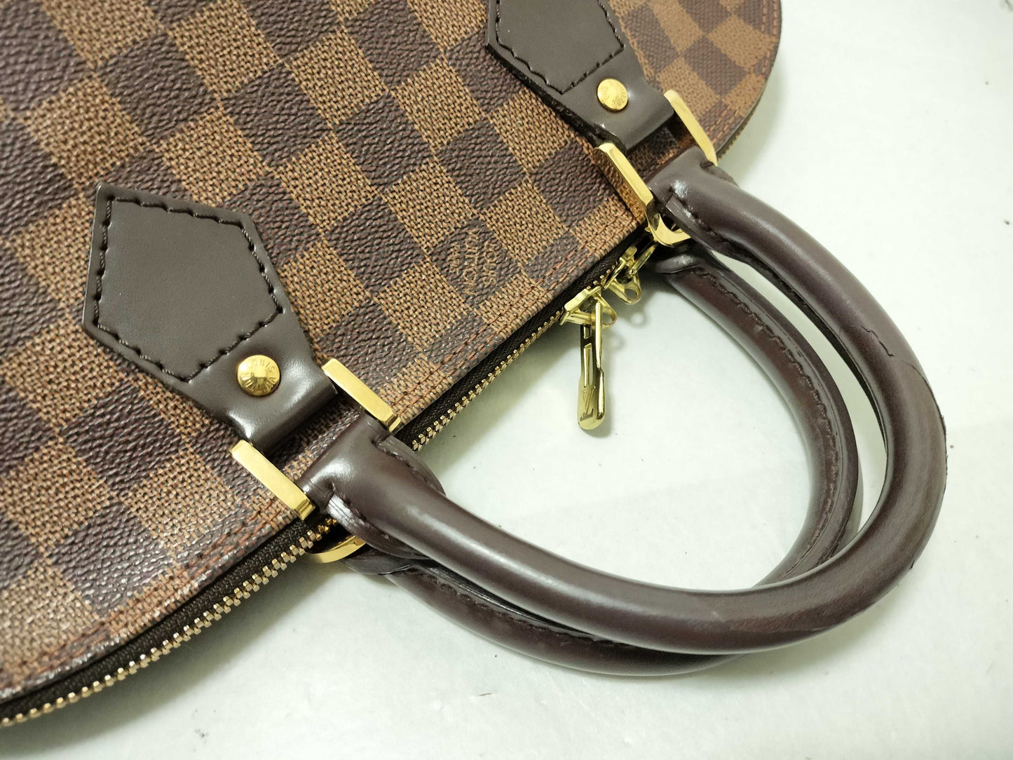 LOUIS VUITTON Damier Alma Handbag