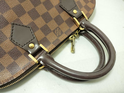 LOUIS VUITTON Damier Alma Handbag