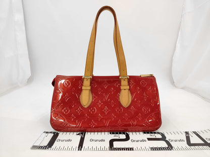 LOUIS VUITTON Monogram Empreinte Louis Vuitton Vernis Rosewood Avenue Handbag