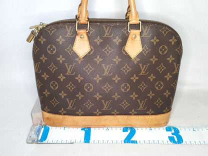 LOUIS VUITTON Monogram Alma Handbag M51130