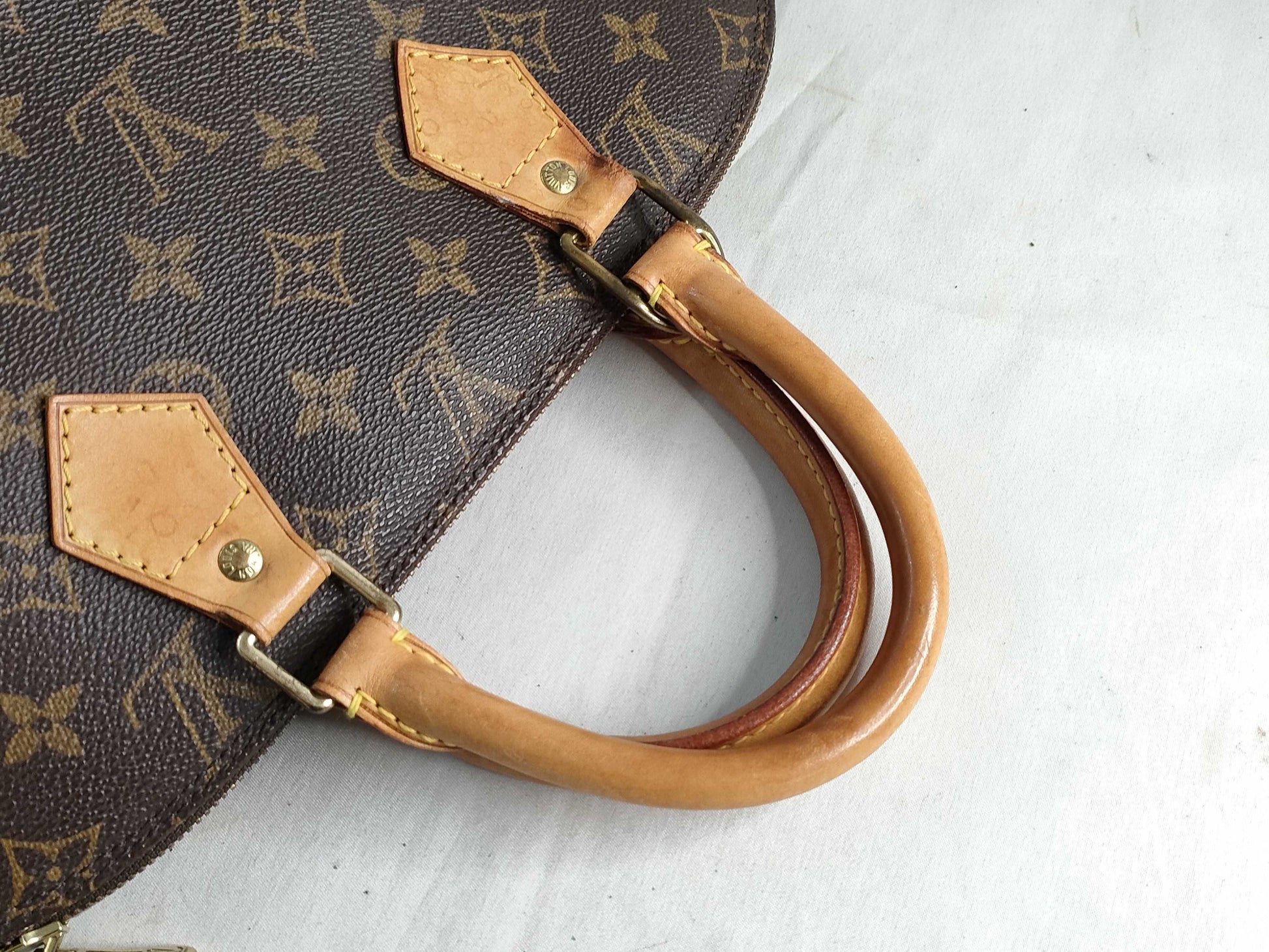 LOUIS VUITTON Monogram Alma Handbag M51130
